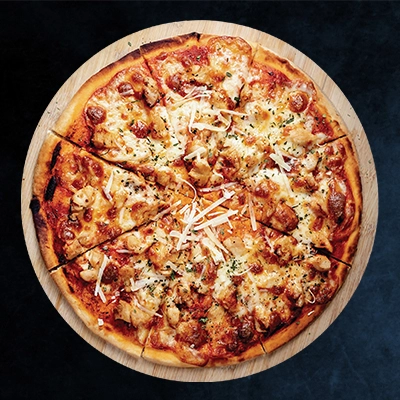 Hand-tossed Pizza with Unique Indian and Mexican Toppings