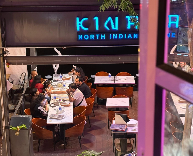 Fresh butter naan being prepared in tandoor