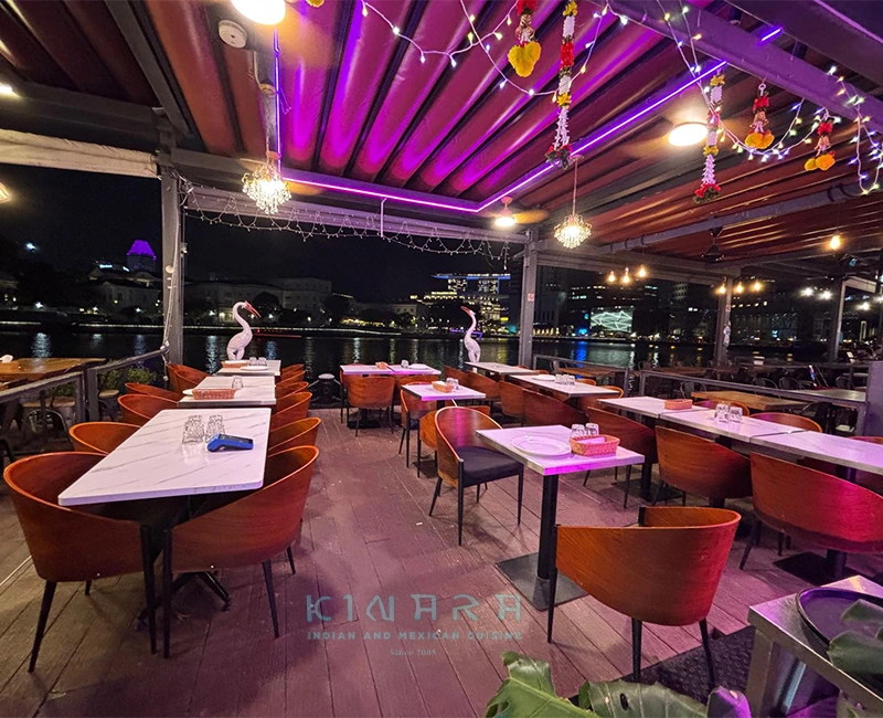 Cocktail bar counter with colorful glassware